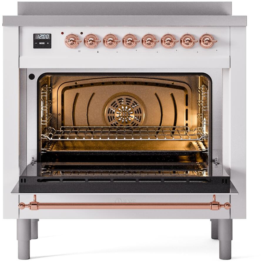 White freestanding induction range with open oven, copper control knobs, roasting rack inside.