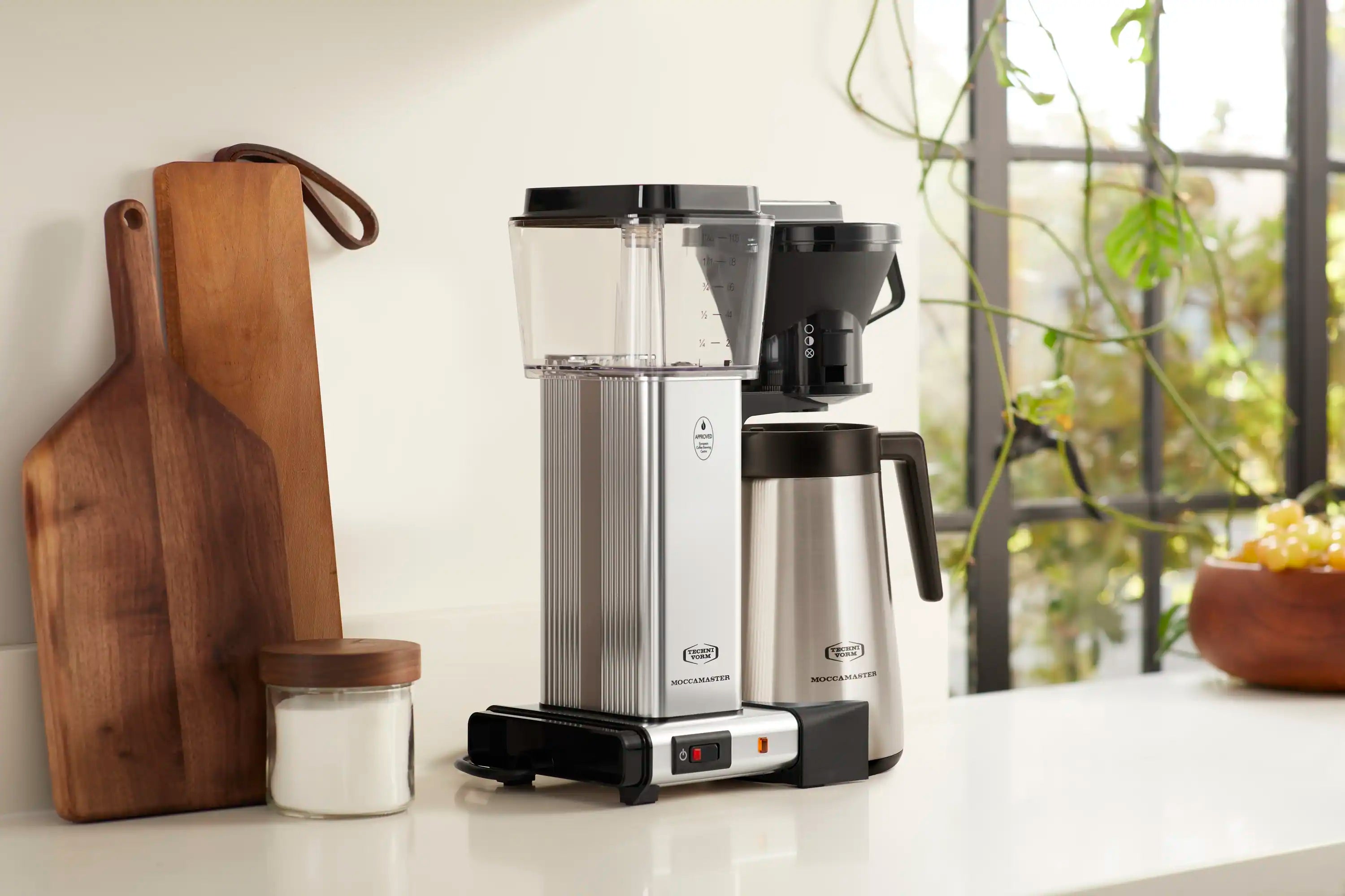 Silver and black thermal carafe coffee maker with stainless carafe and drip stop
