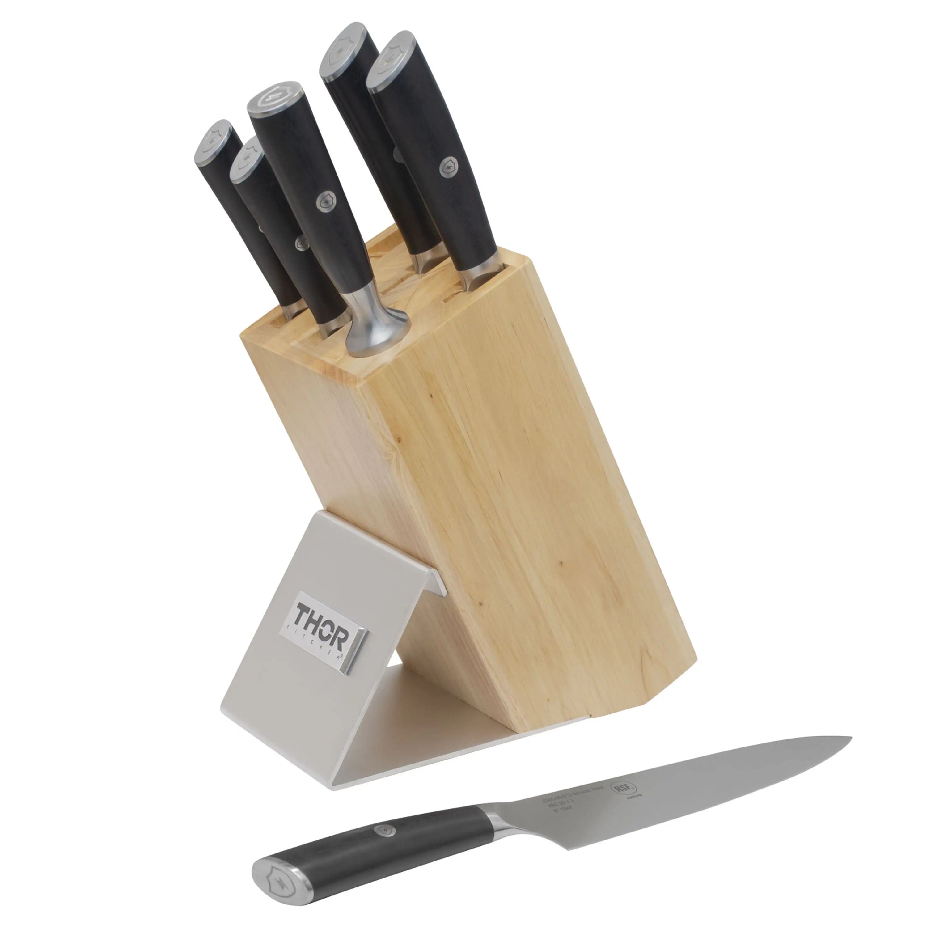 7-piece knife set with black handles, stainless blades, and light wood knife block
