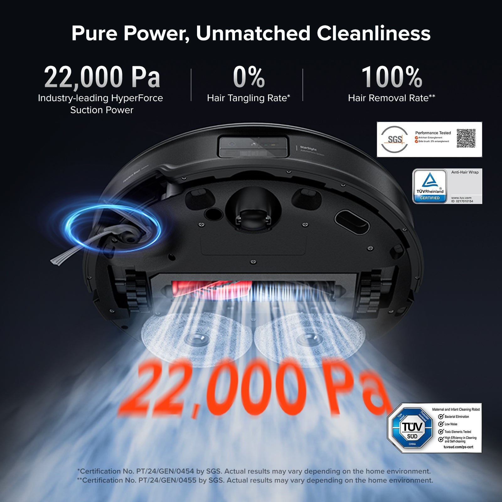 Bottom view of black Roborock robot vacuum showing suction ports and main brush area