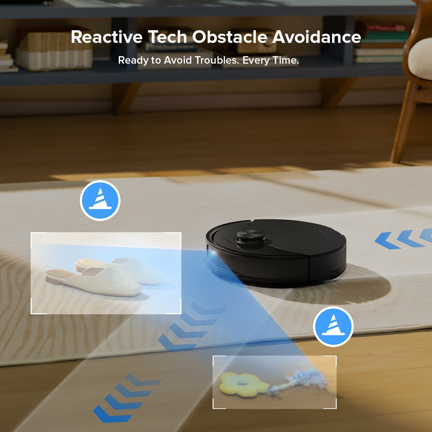 Black robot vacuum on hardwood floor with obstacle-avoidance guidance arrows.