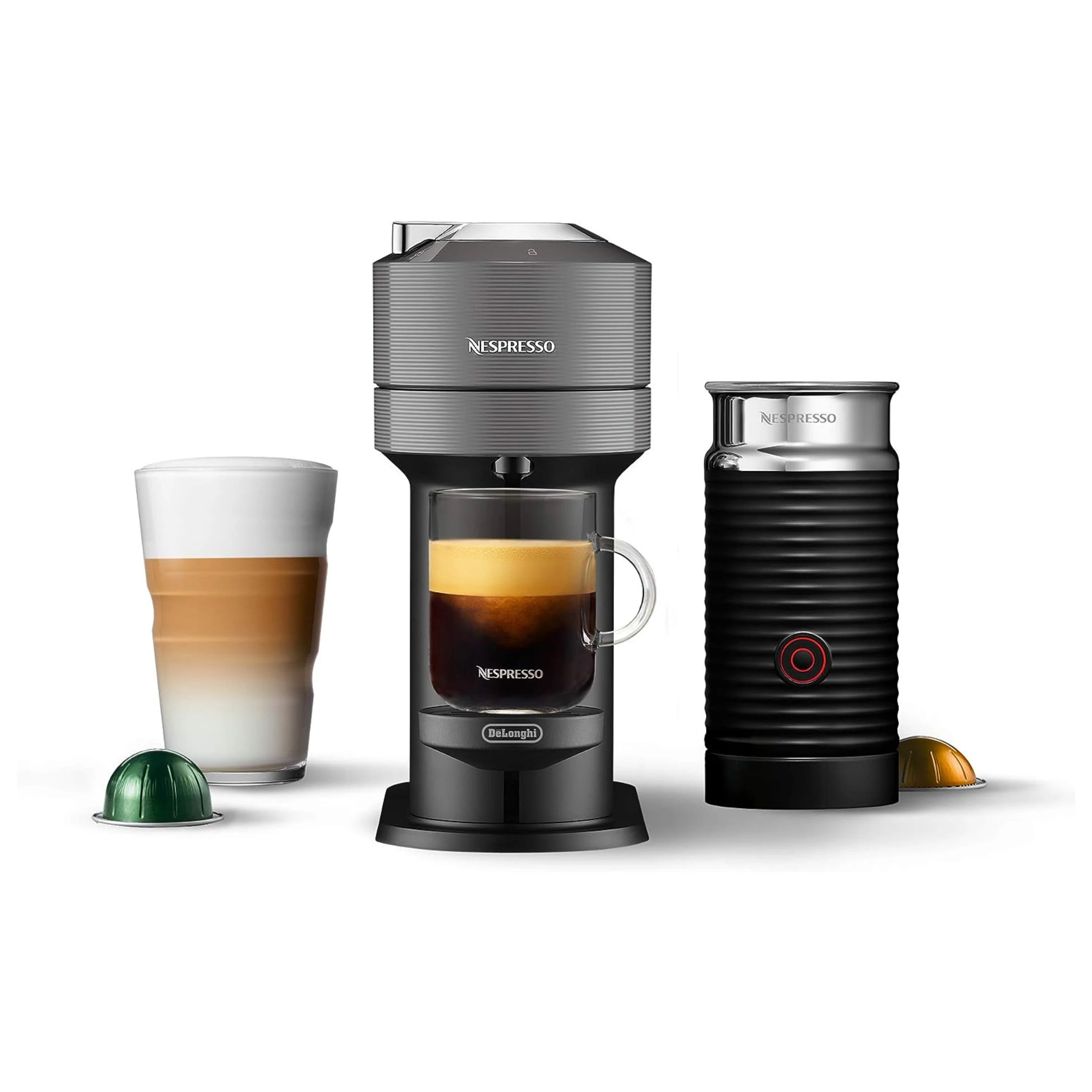 Black and gray Nespresso coffee maker with Aeroccino3 milk frother and two filled cups