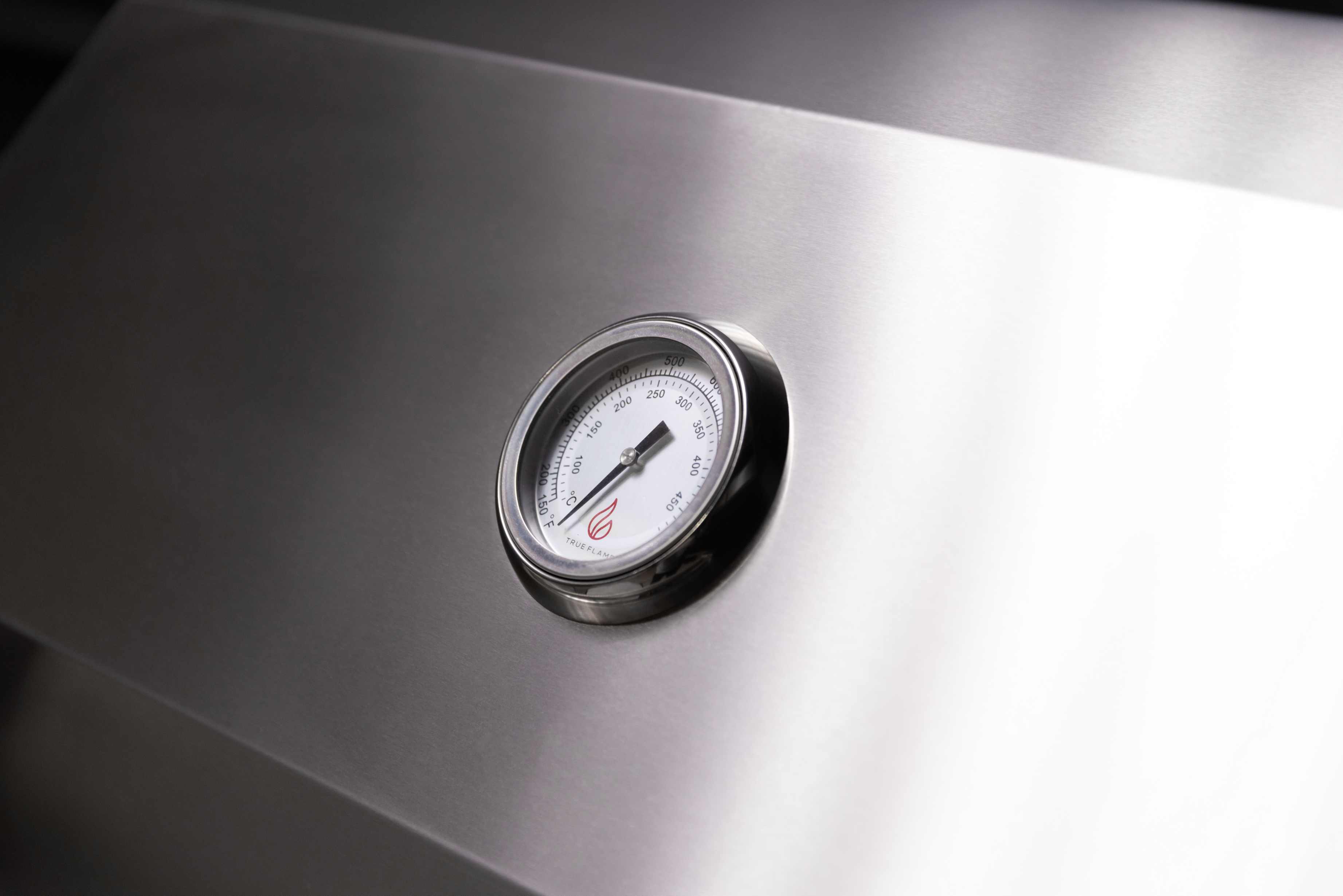 Stainless steel gas grill thermometer gauge on the front control area