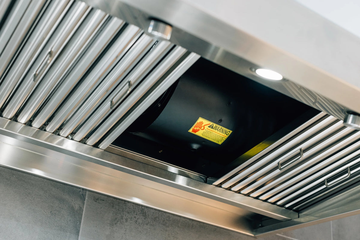 Stainless steel wall-mount vent hood with baffle filters and interior light