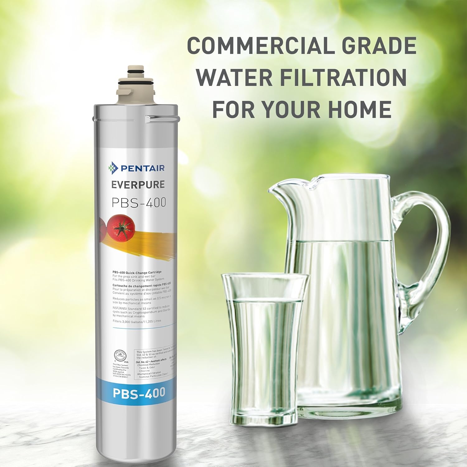PBS-400 water filter cartridge with top cap, beside a glass pitcher