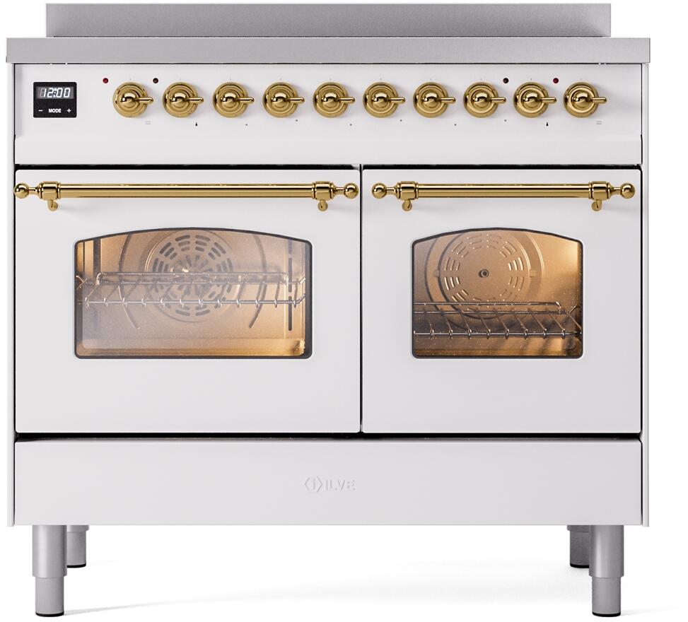 White freestanding electric induction range with brass-trimmed oven doors
