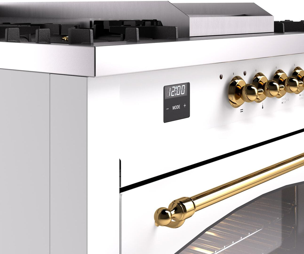 White range control panel with brass knobs and digital display