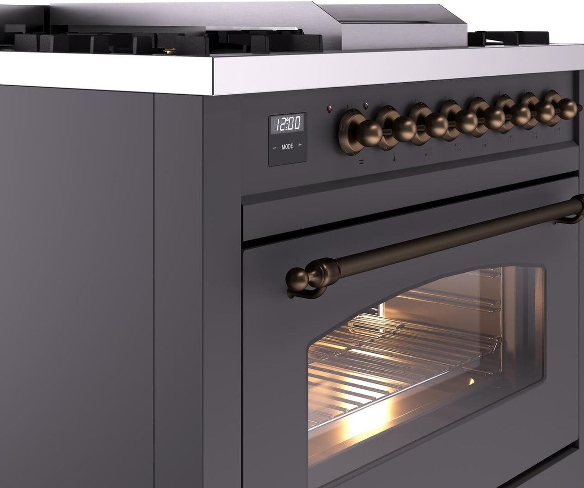 Freestanding range oven door and bronze control knobs with matte graphite finish