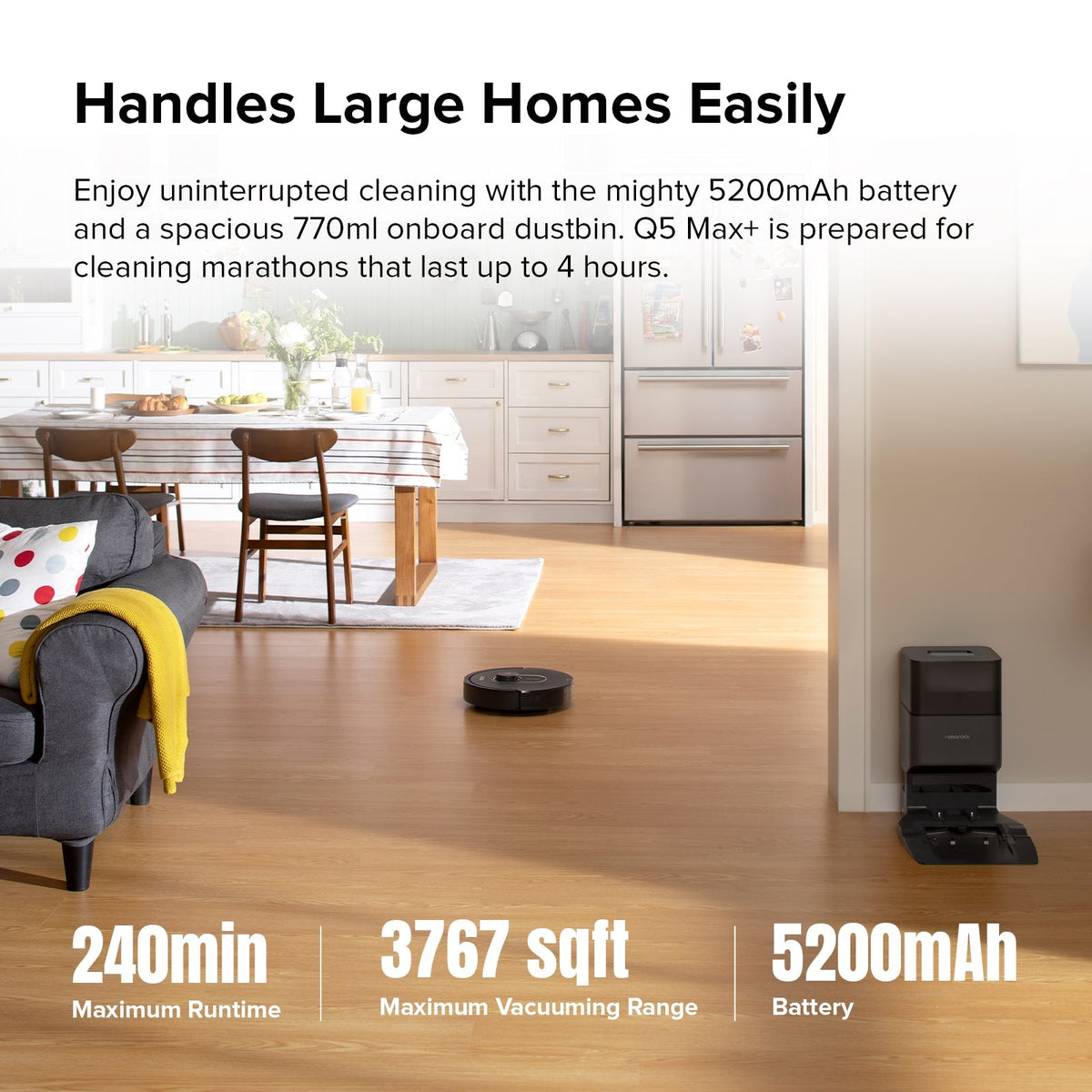 Roborock robot vacuum cleaner on hardwood floor with charging dock, dark gray