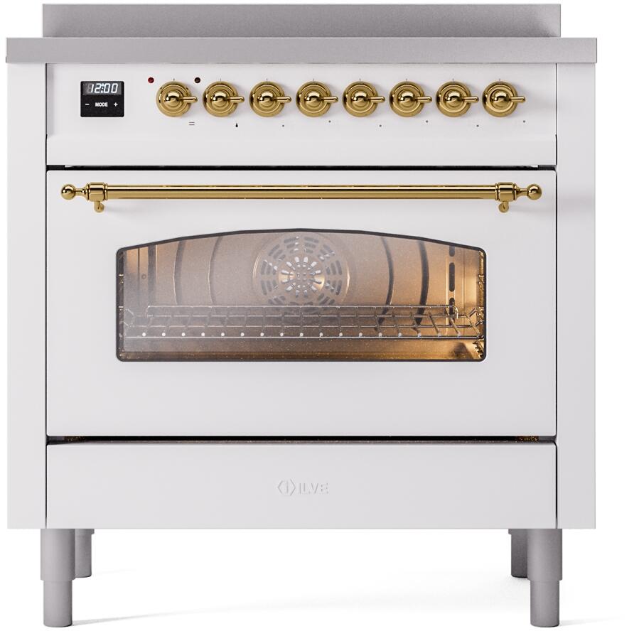White induction range with brass-trim oven door handle and glass viewing window