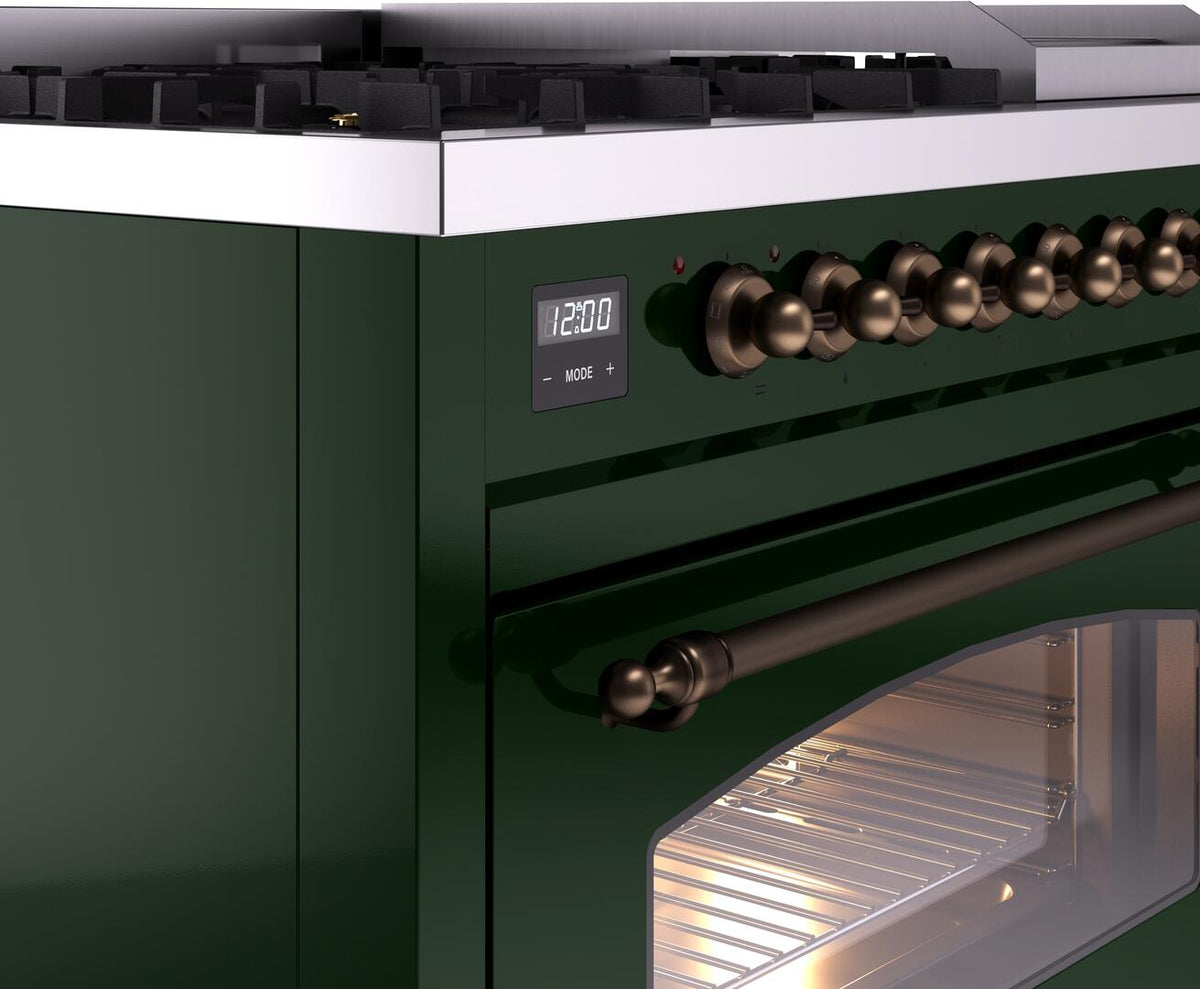 Dual fuel range control panel detail with display, burner knobs, and oven door opening