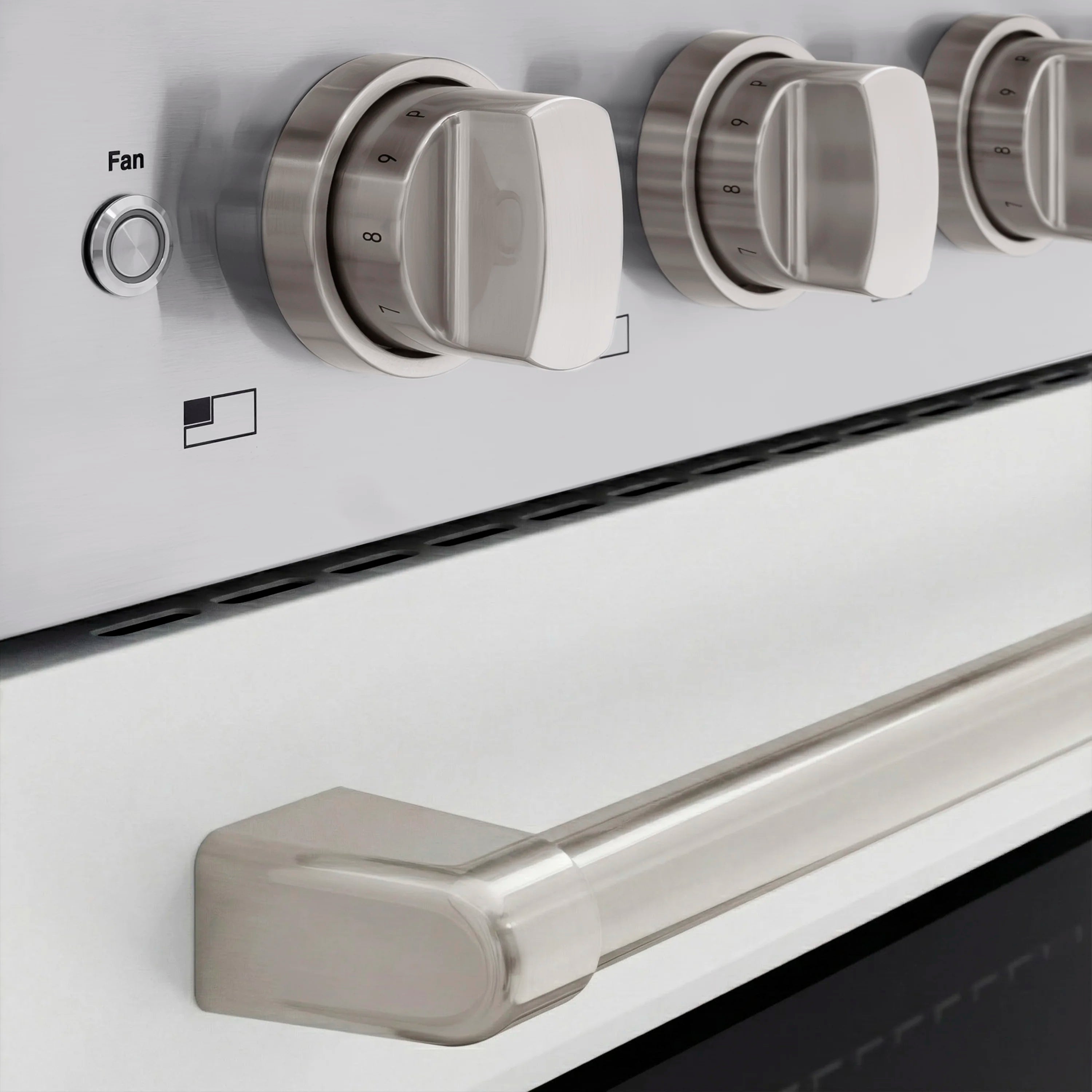 Stainless oven front with control knobs and smooth white exterior panel.
