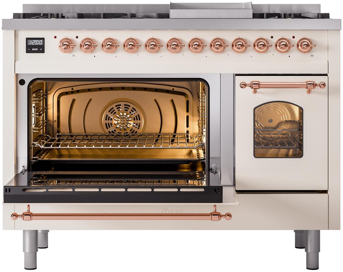 Freestanding dual-fuel range with open oven door and lit interior