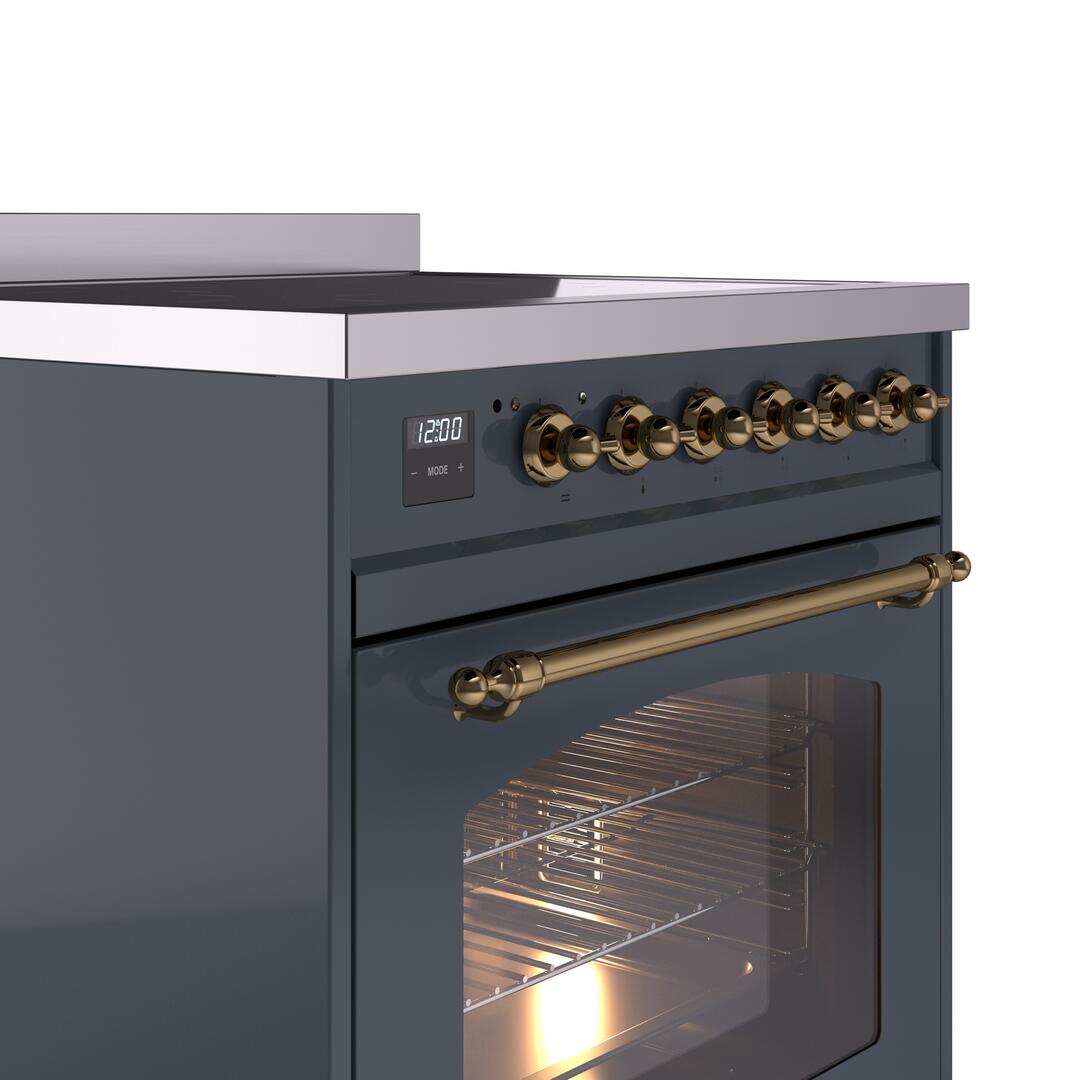Blue grey range control panel with brass knobs and display, oven door closed
