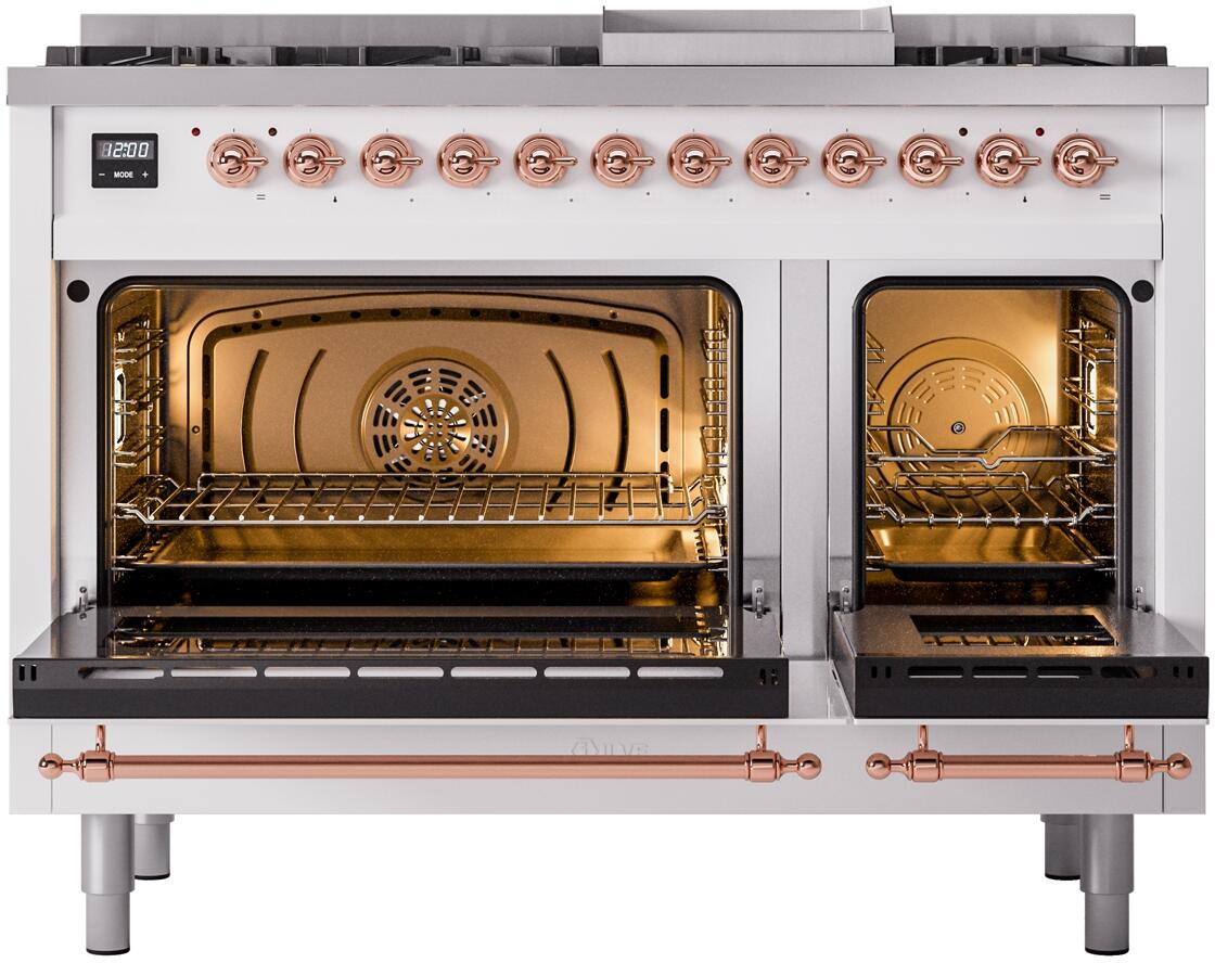 White freestanding dual fuel range with copper trim, oven doors open with interior light