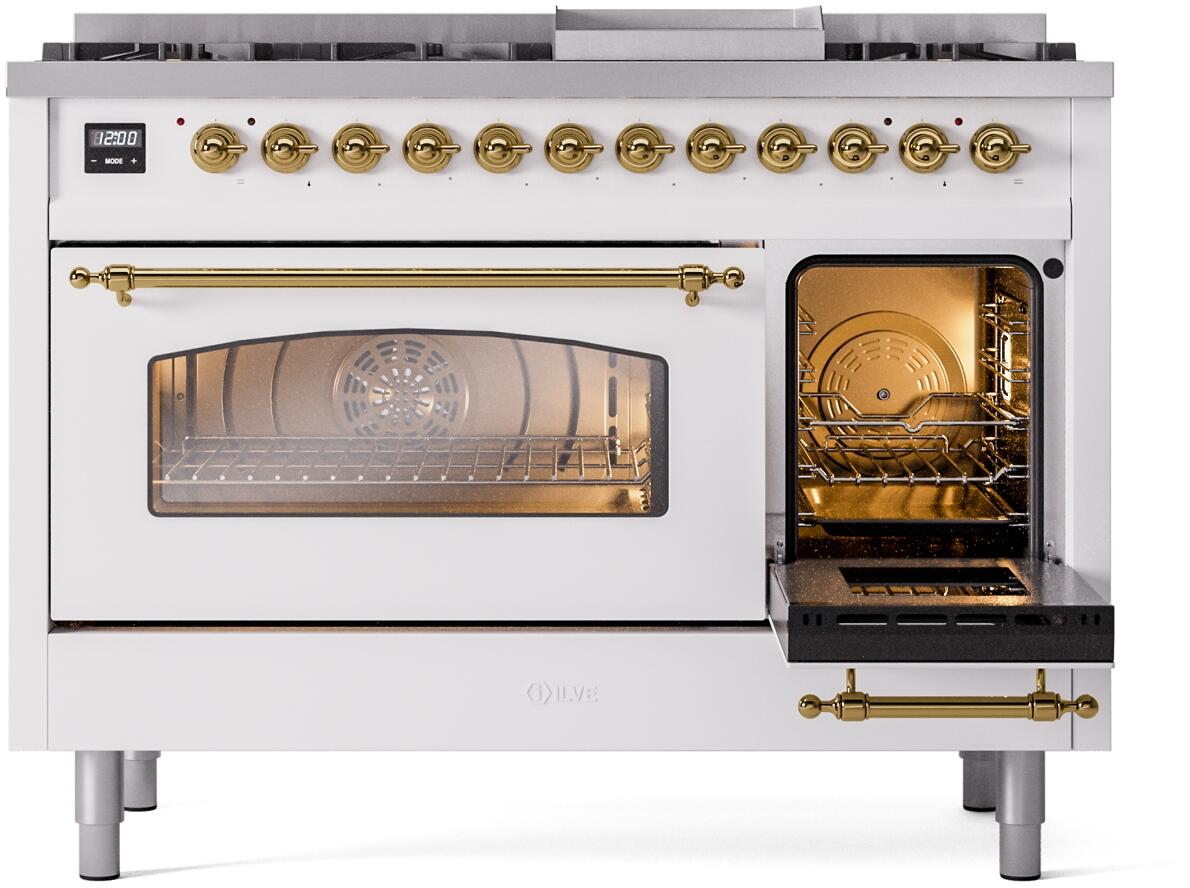 White freestanding dual fuel range with brass trim, open oven doors, and brass control knobs.