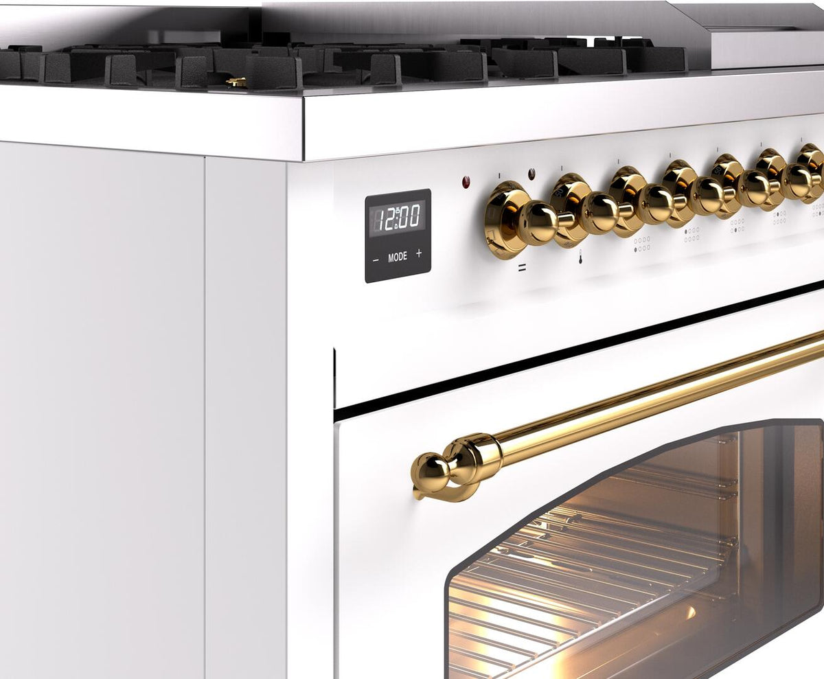 Freestanding dual-fuel gas range, brass control knobs and display panel with oven door window