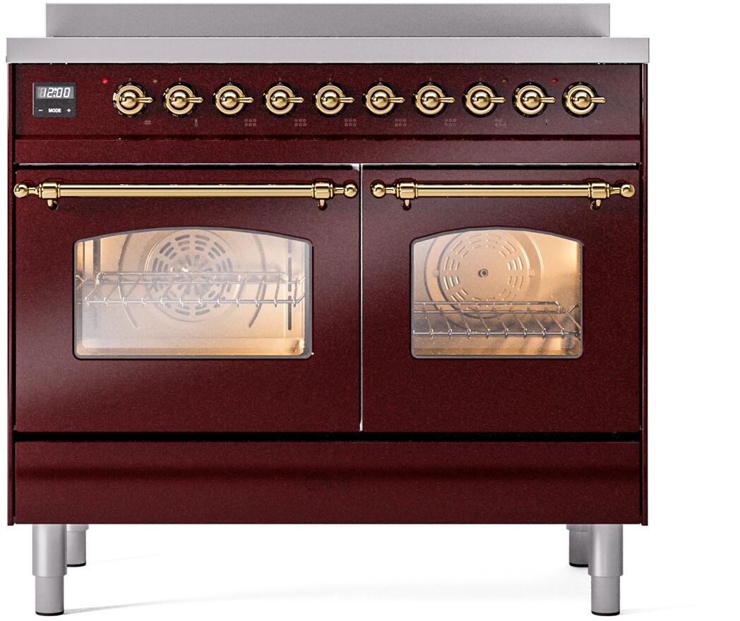 Freestanding burgundy induction range with brass trim, twin oven doors with glass windows