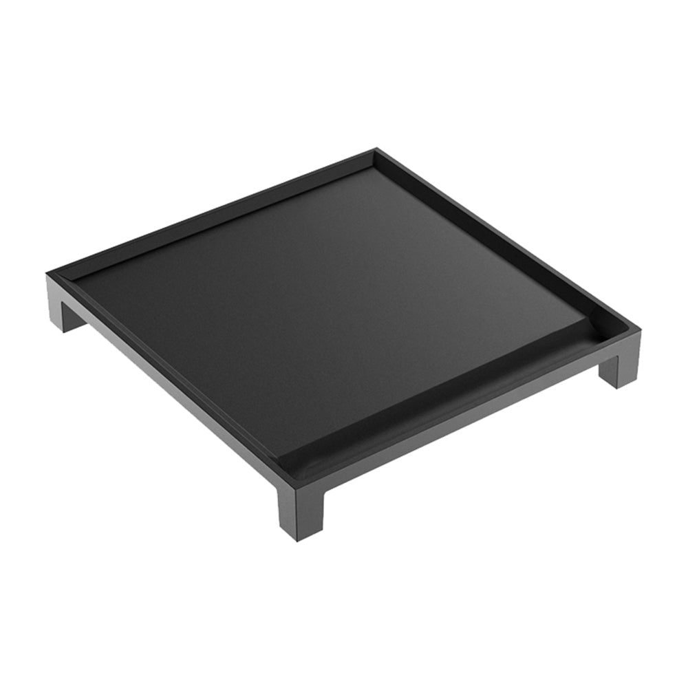 Flat cast iron griddle pan with raised edges, black finish, corner supports
