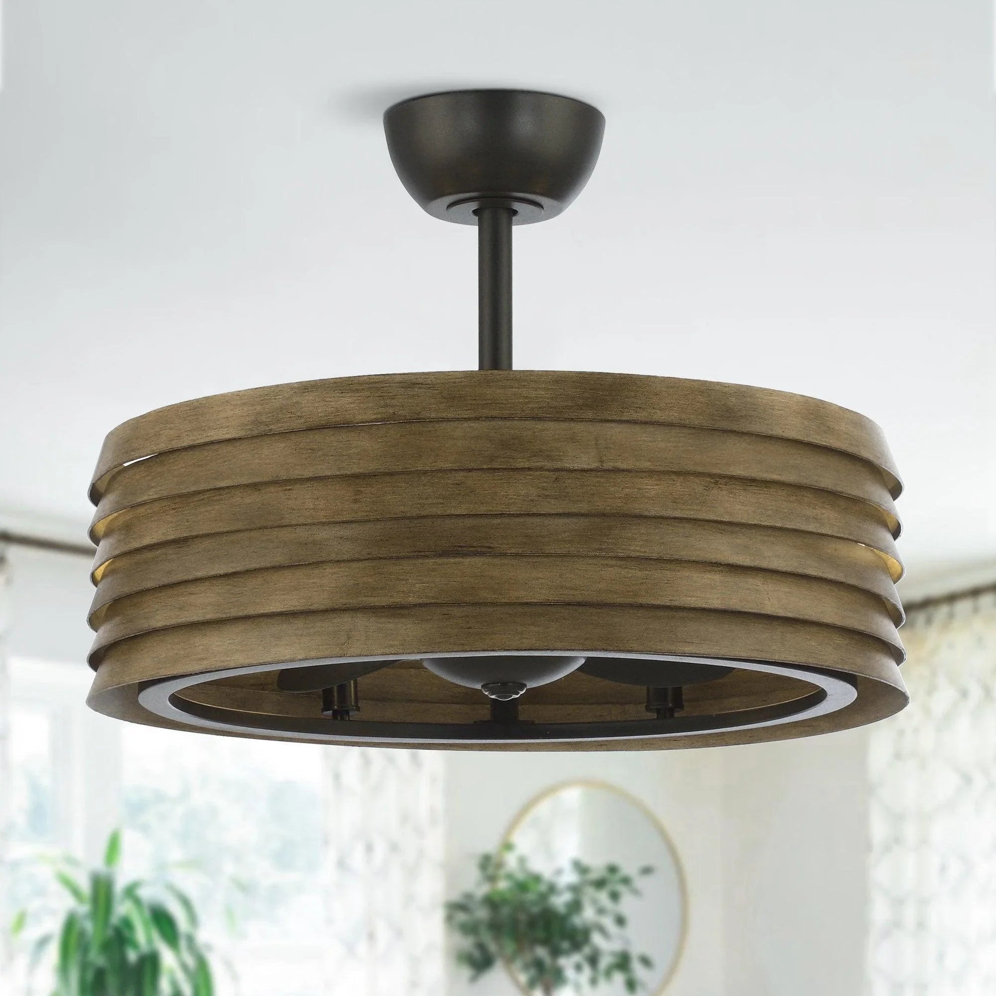 Brown farmhouse ceiling fan with stacked blade design and integrated light kit