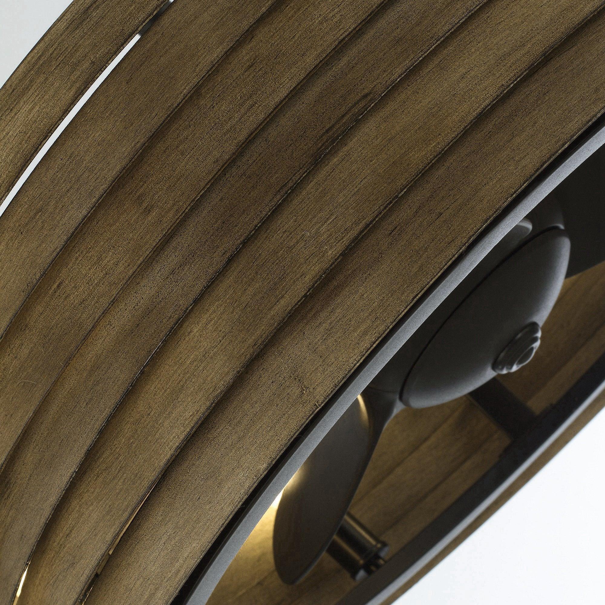 Brown woodgrain fan blades with gray light shades and black motor housing