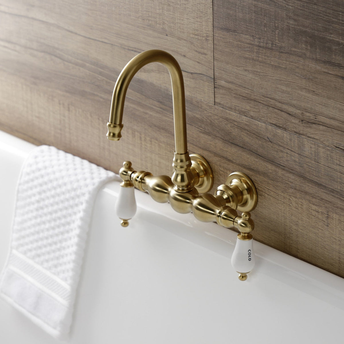 Aqua Vintage 3-3/8 Inch Wall Mount Tub Faucet in Brushed Brass