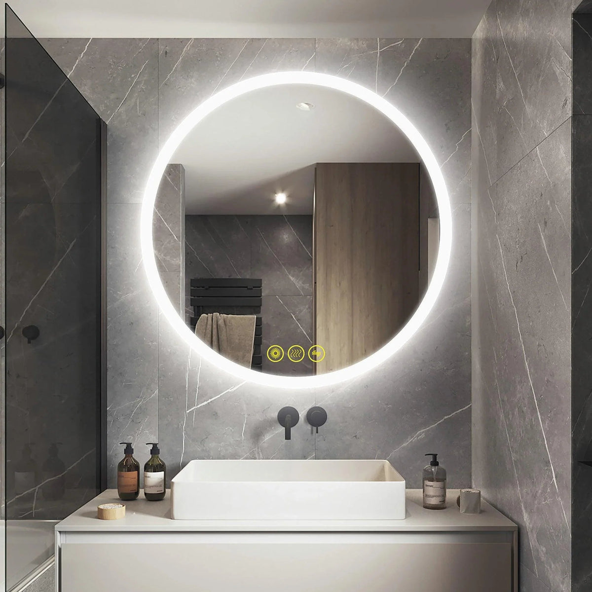 Frameless round LED bathroom vanity mirror with bright glowing rim above sink