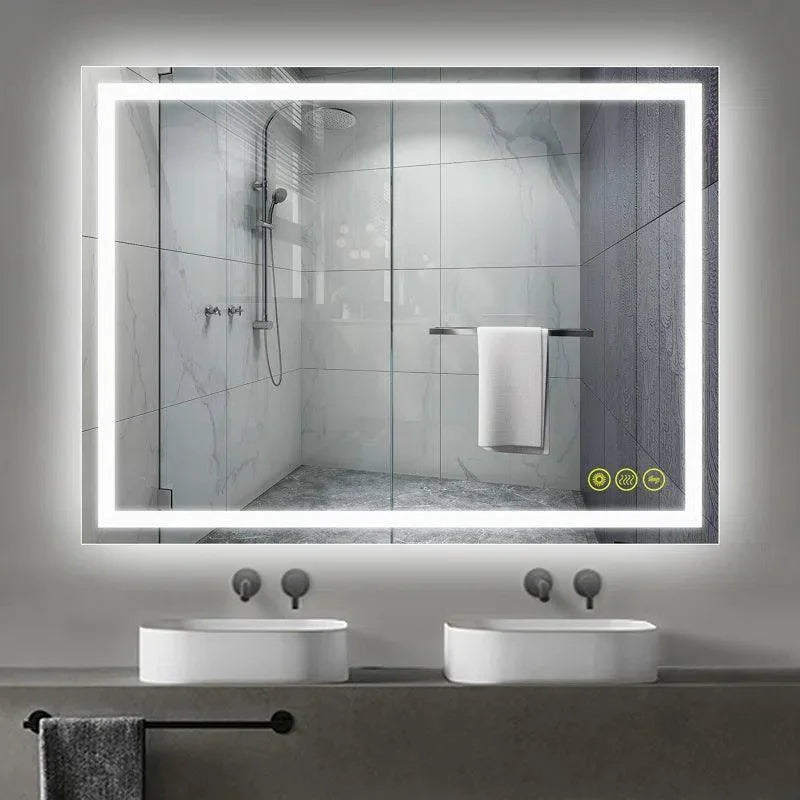 Backlit rectangular bathroom mirror with glowing white LED border over shower area.