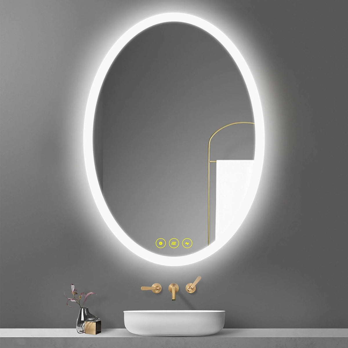 Oval LED frameless mirror above a bathroom sink, with bright perimeter light