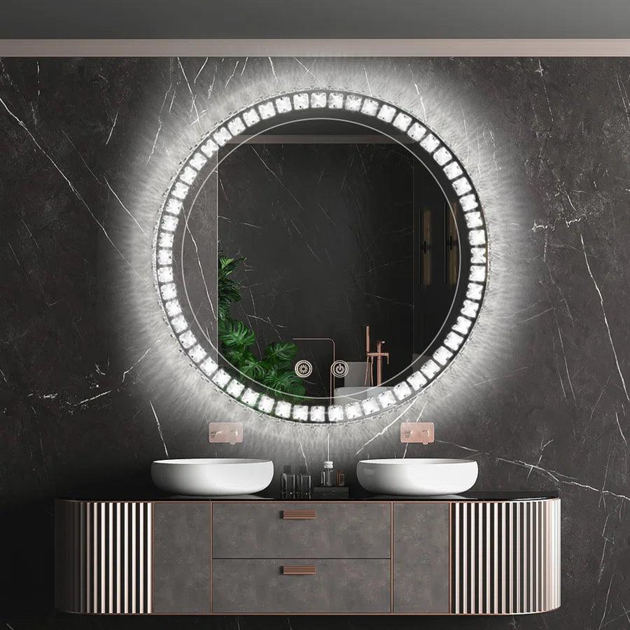 Round LED bathroom mirror with glowing border above double sinks on vanity