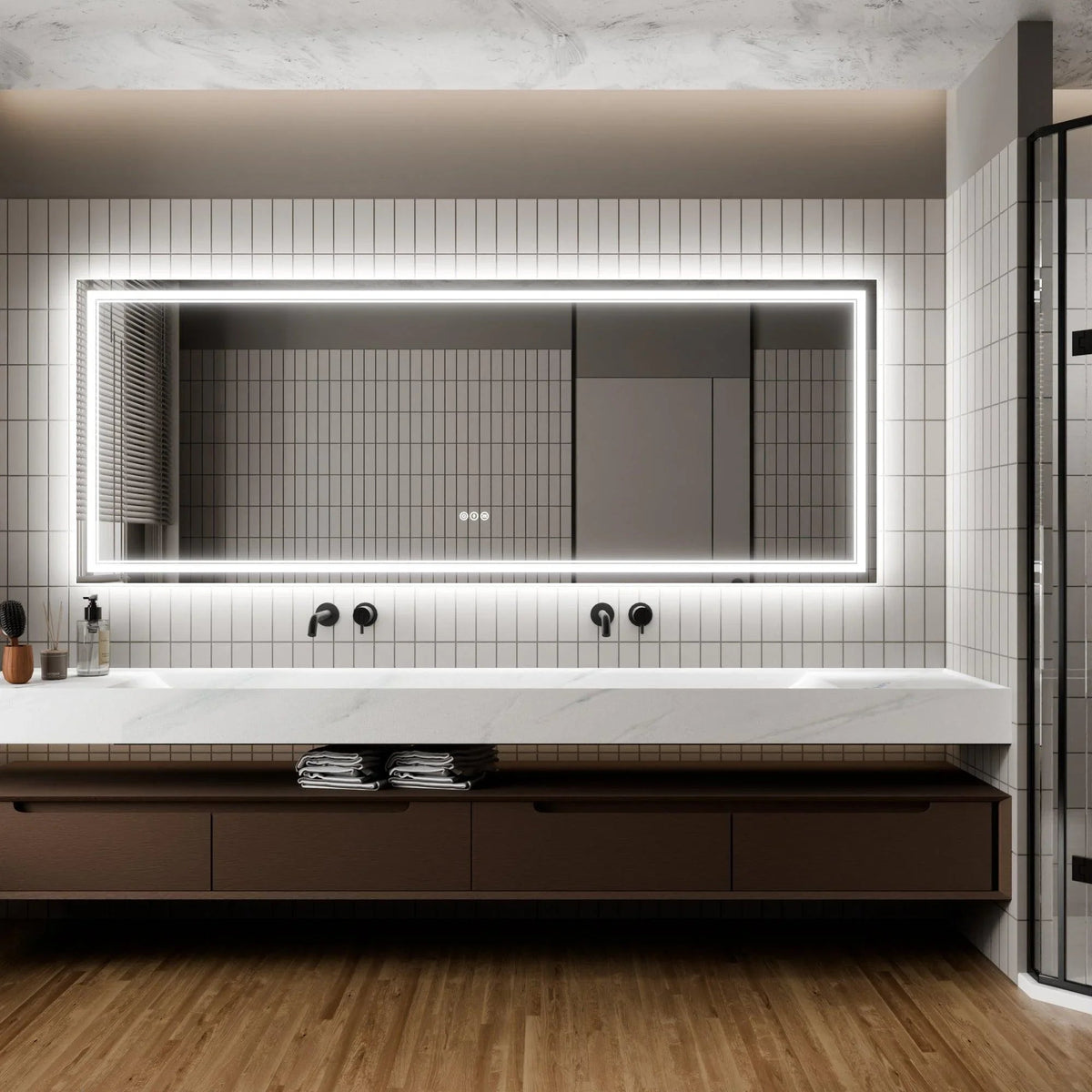 Backlit rectangular LED bathroom mirror with white frame and wall switch buttons