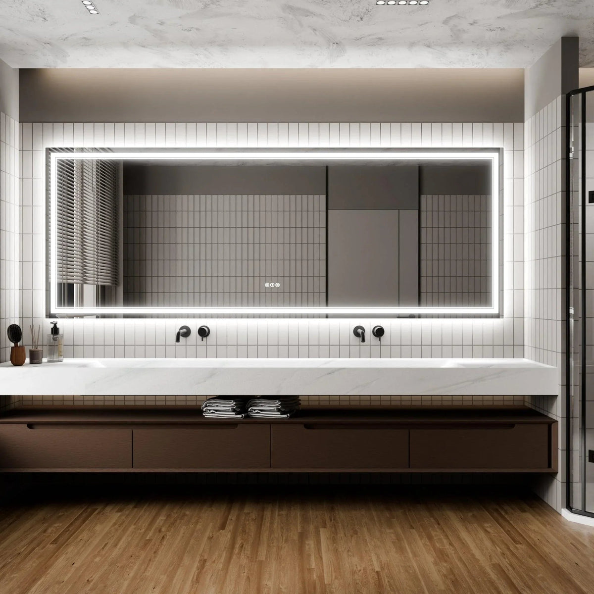 Backlit bathroom LED mirror with glowing frame centered above the vanity.