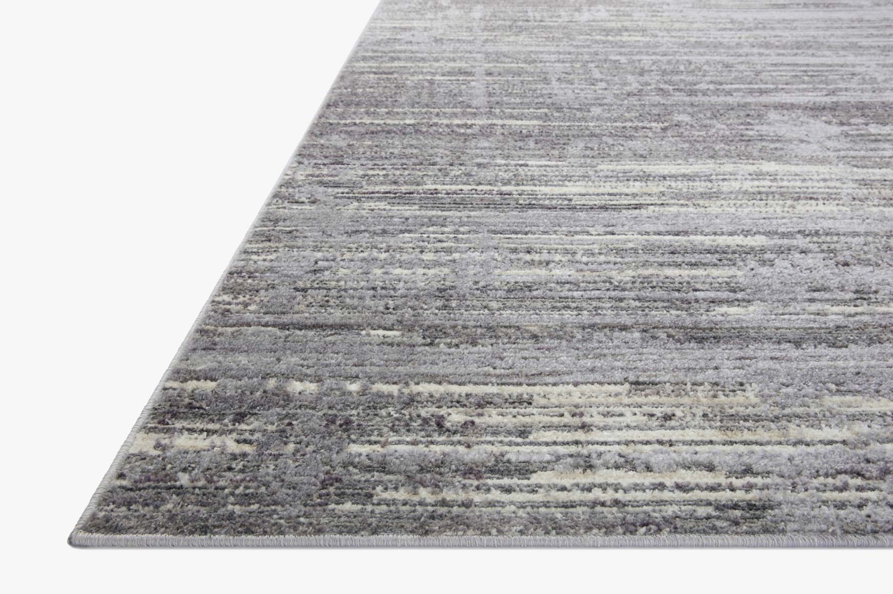 Grey and ivory area rug with textured horizontal stripe pattern, angled corner view