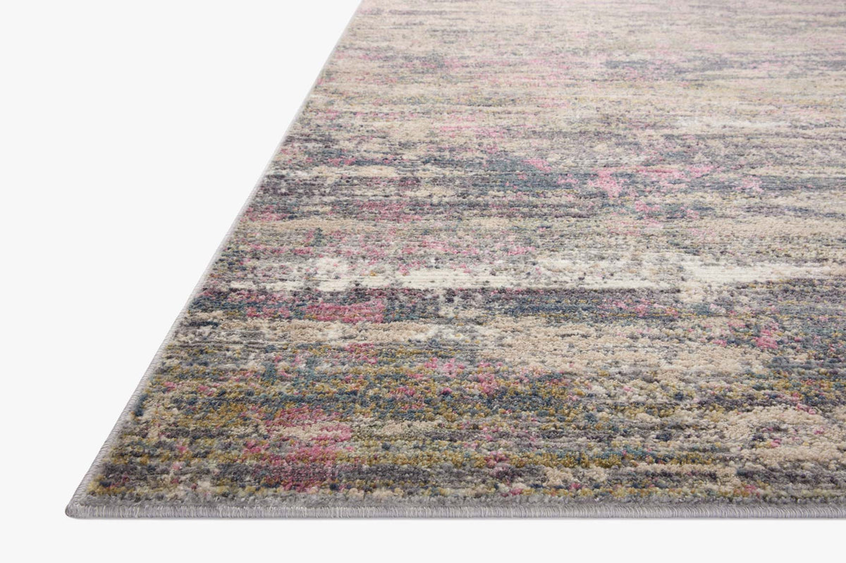 Textured runner rug with multicolor abstract speckled stripes on a light background