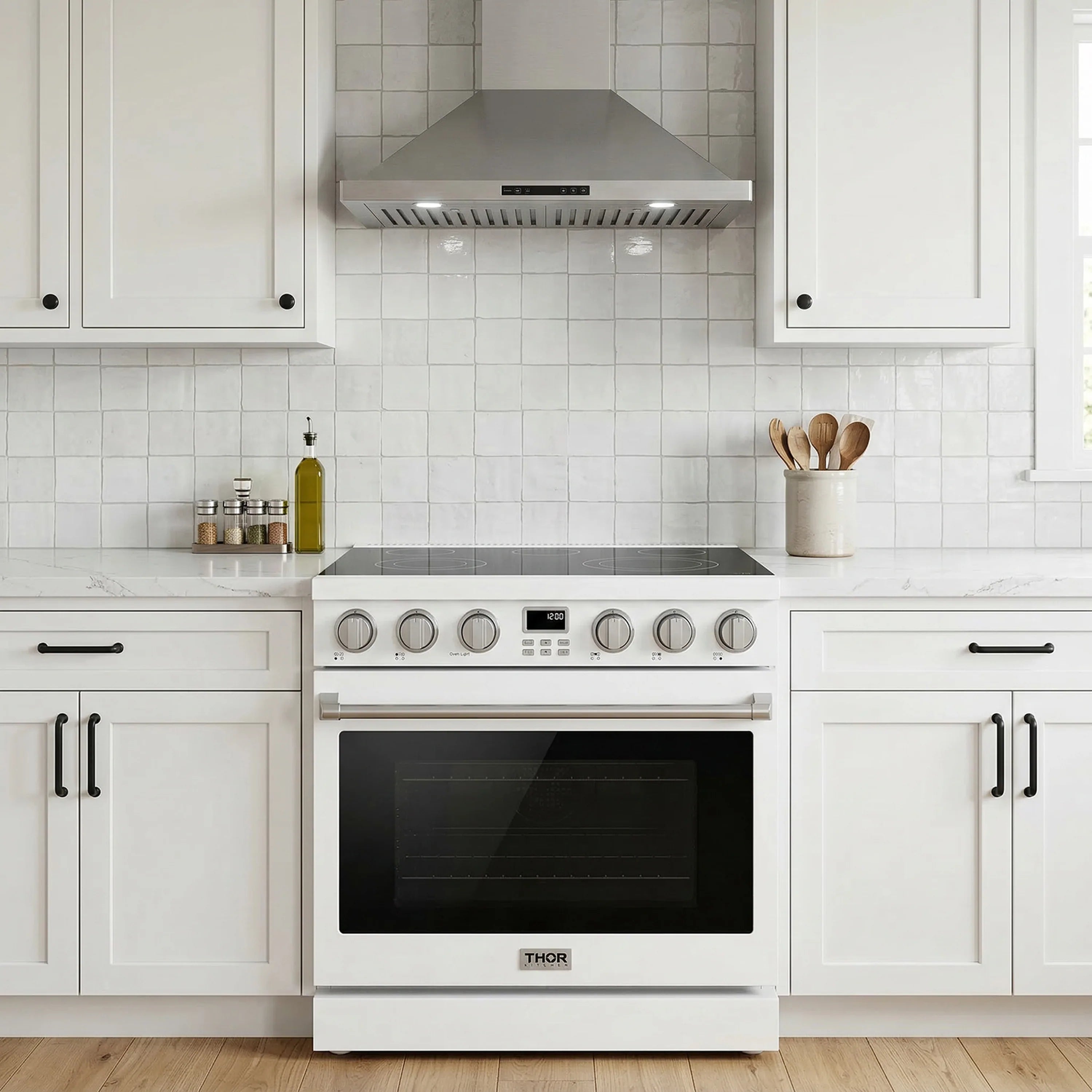 White electric range with oven door and cooktop control knobs in kitchen
