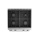 Stainless steel gas cooktop with four burner grates on a freestanding range