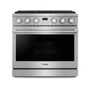 Stainless steel gas range front with control knobs and oven door window