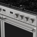Stainless steel range control panel with round knobs and black cooktop burners