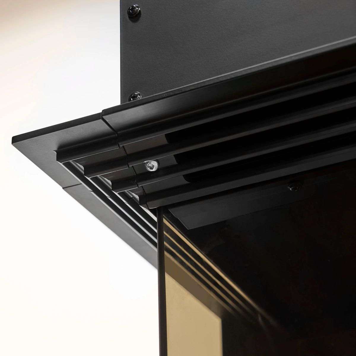 Black side trim accessory with slotted channel and metal support bracket
