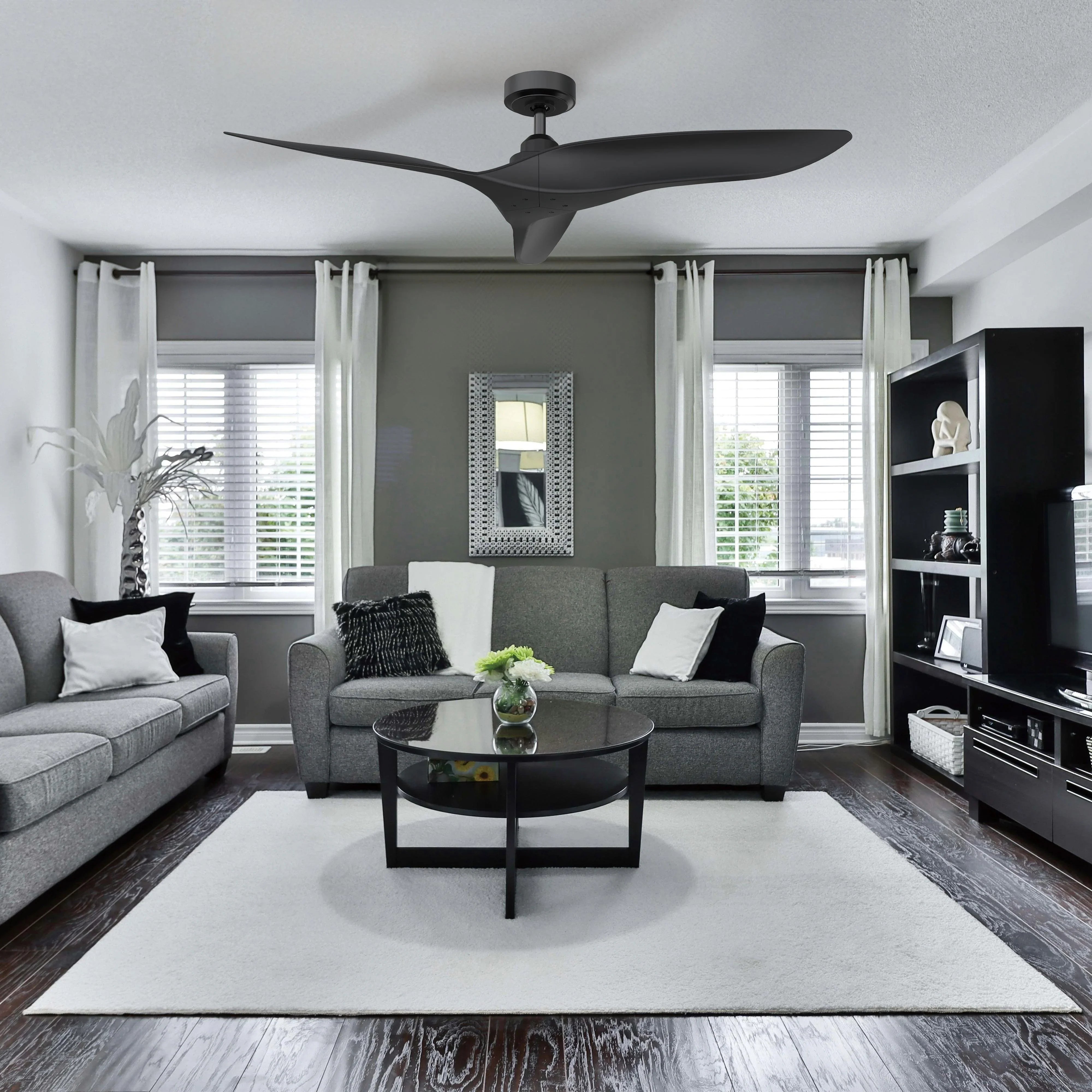 Ceiling fan with DC motor, dark reversible blades on a ceiling mount