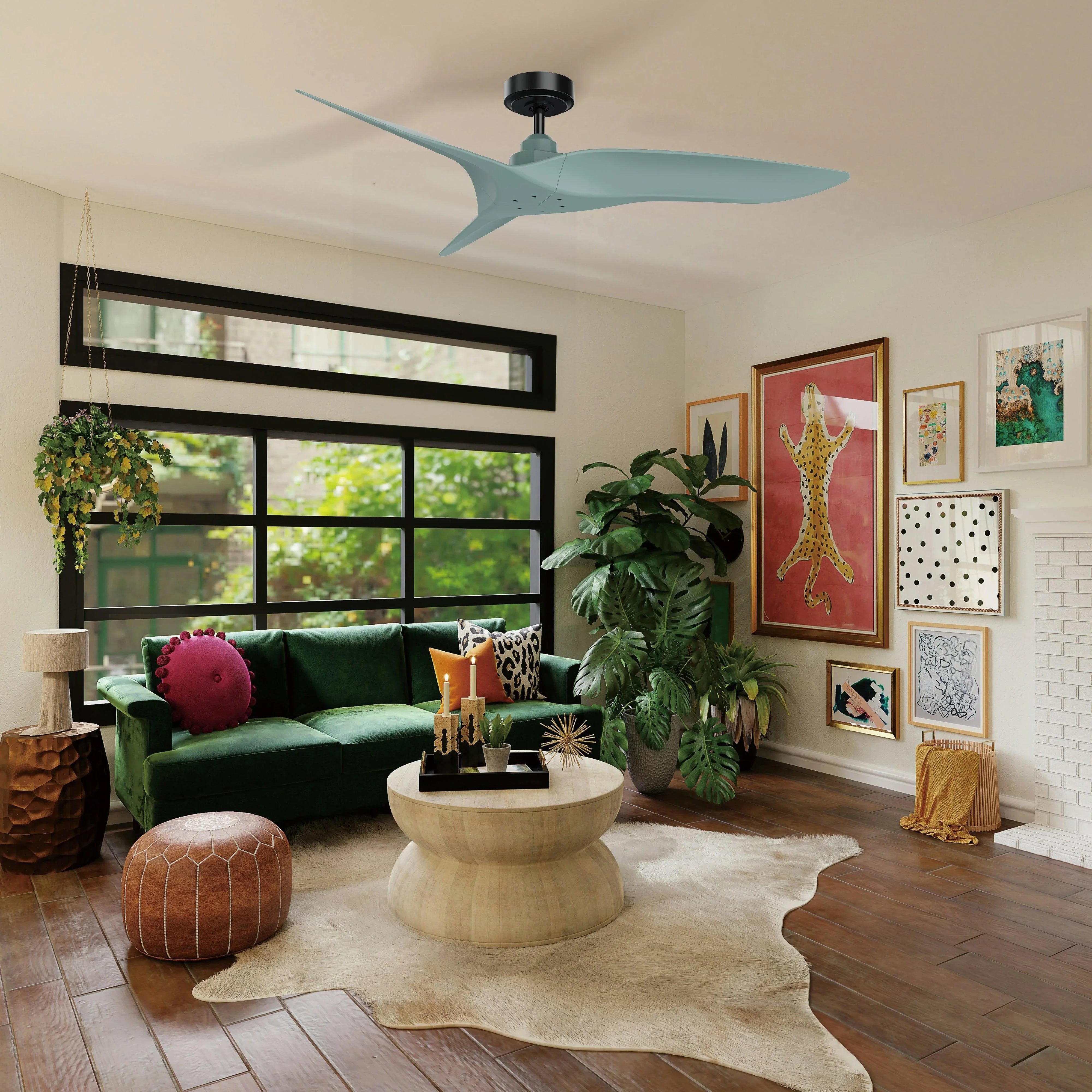 Light blue ceiling fan with three blades and dark motor housing in a styled living room