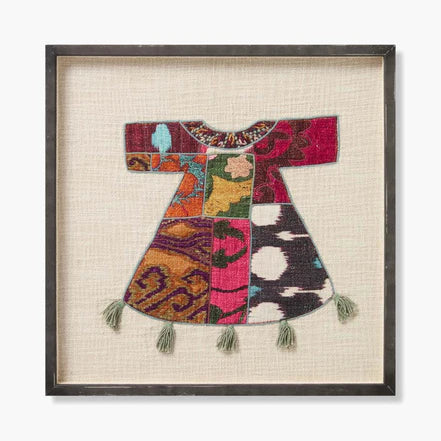 Framed ivory embroidered wall art rug with patchwork dress design, multicolor accents