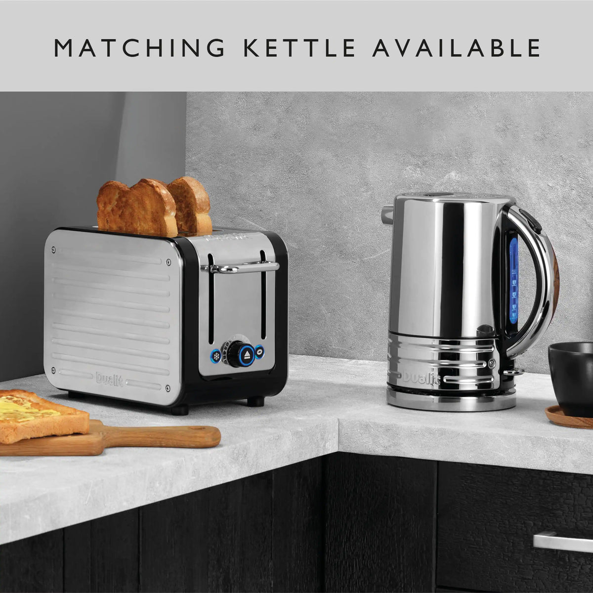 Dualit 2-slice toaster in chrome and black with bread pieces ready to toast