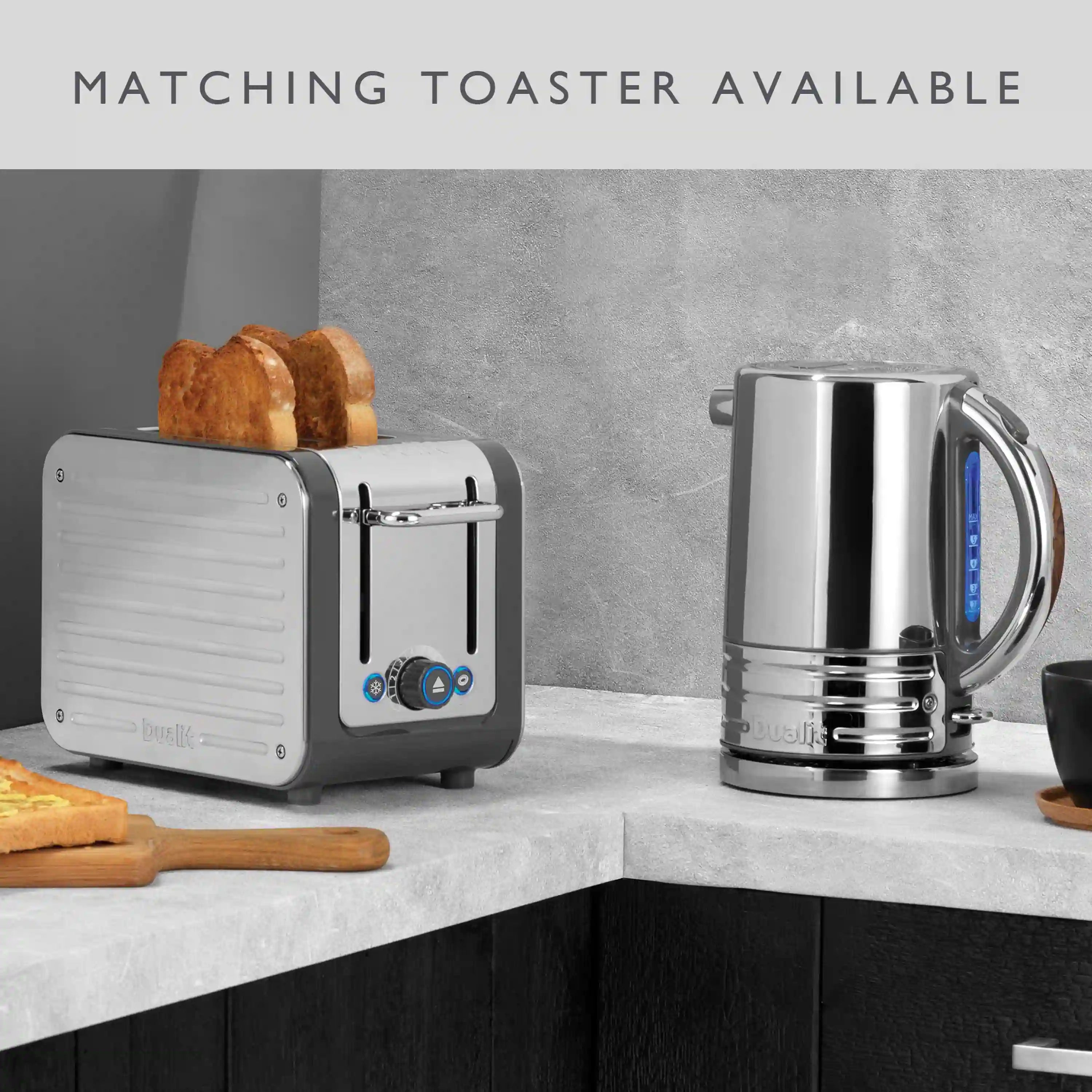 Stainless steel electric kettle on counter with matching toaster shown in scene