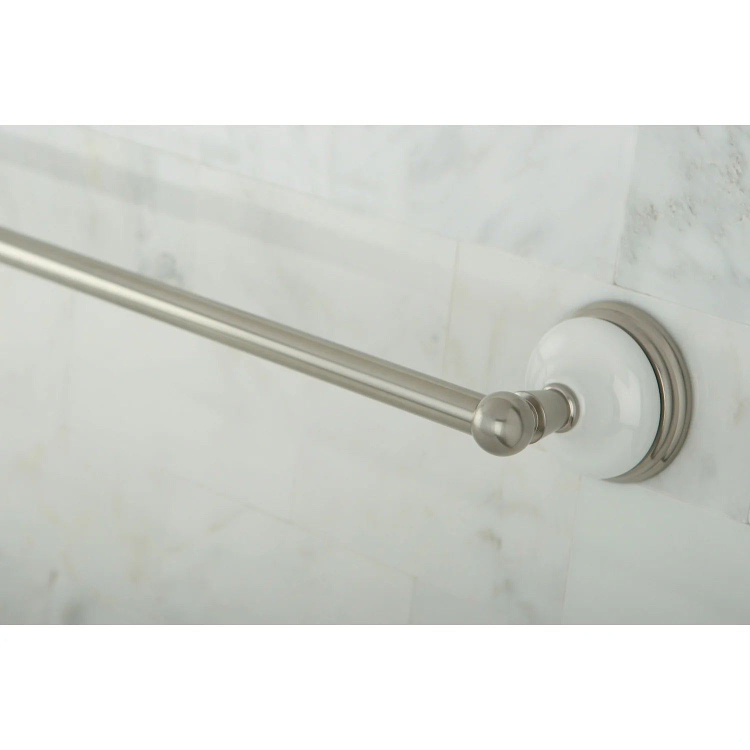 Wall-mounted towel bar rail in brushed nickel with white decorative base.