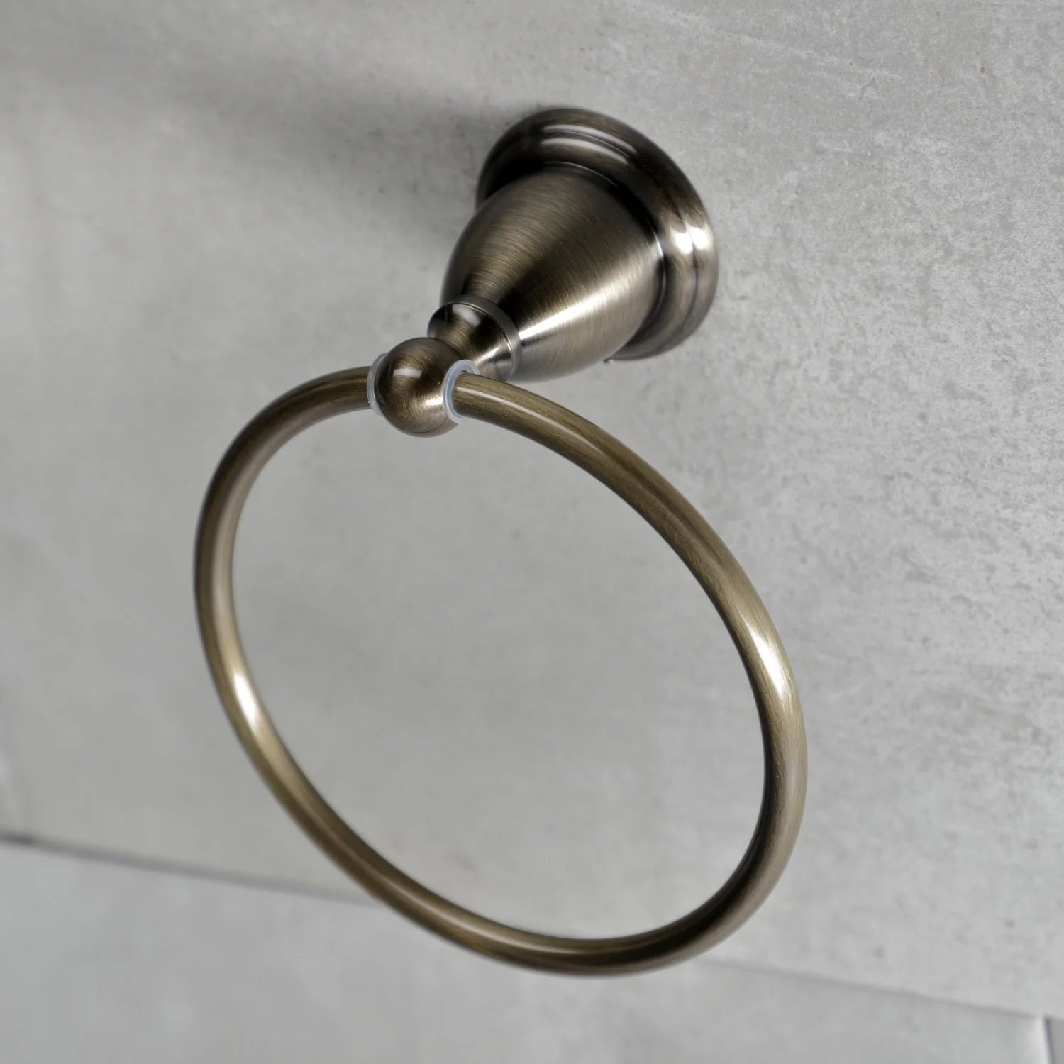 Antique brass towel ring with wall-mounted round bracket