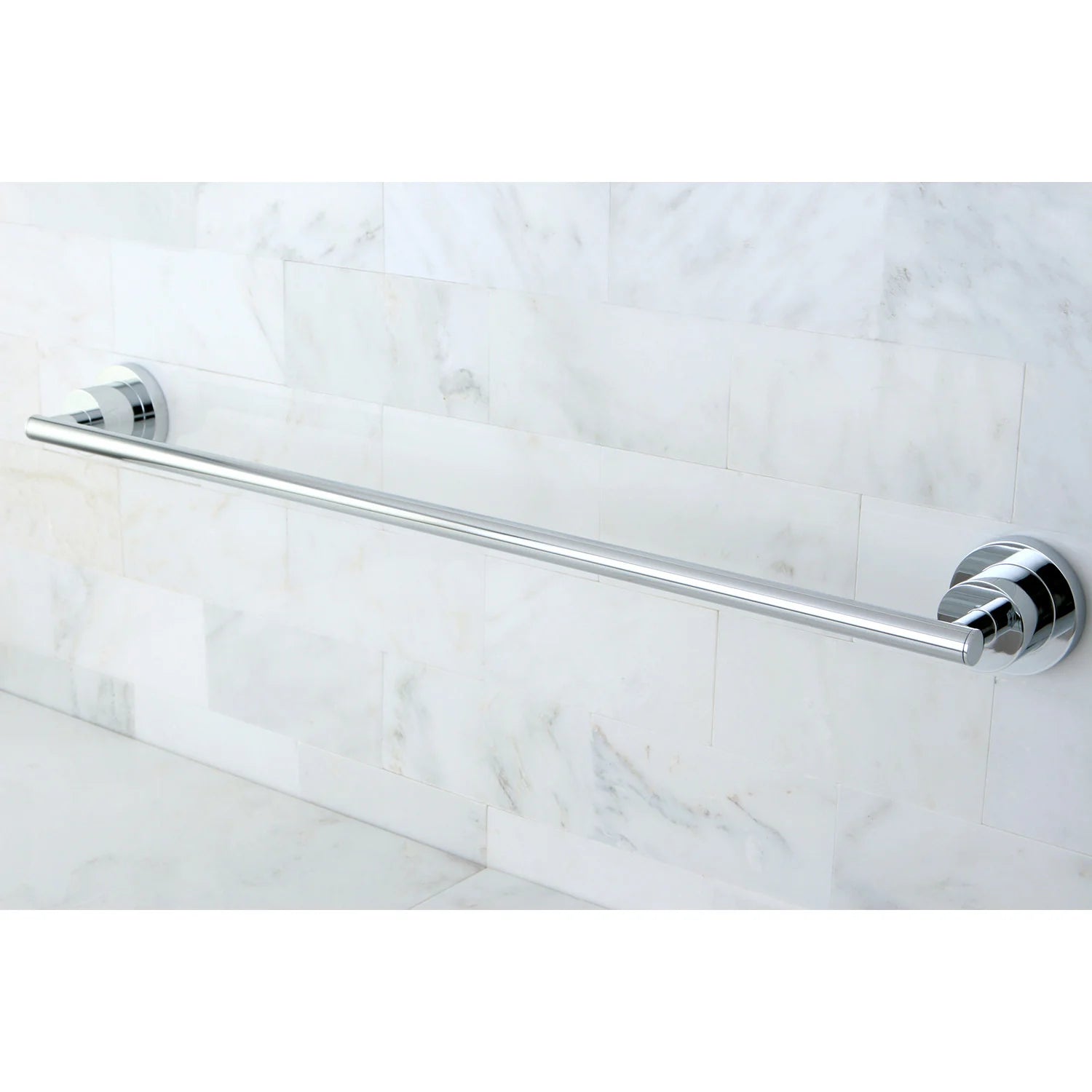 Polished chrome single towel bar with two circular end caps mounted on wall