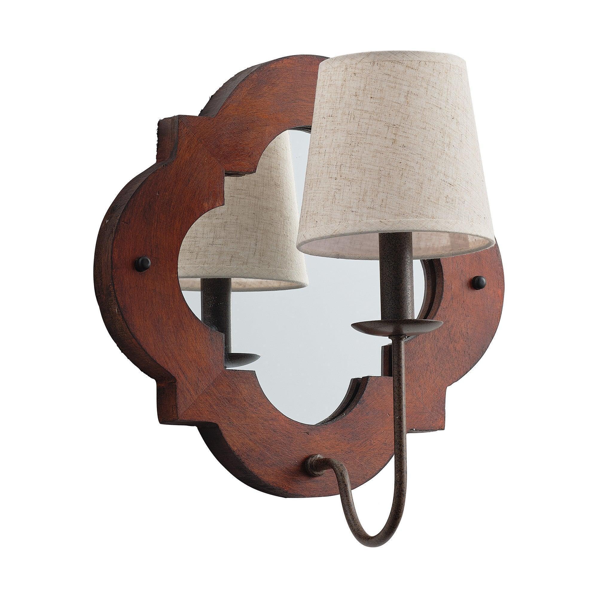 Rustic brown wall sconce with two fabric shades and curved metal arms attached to wood frame