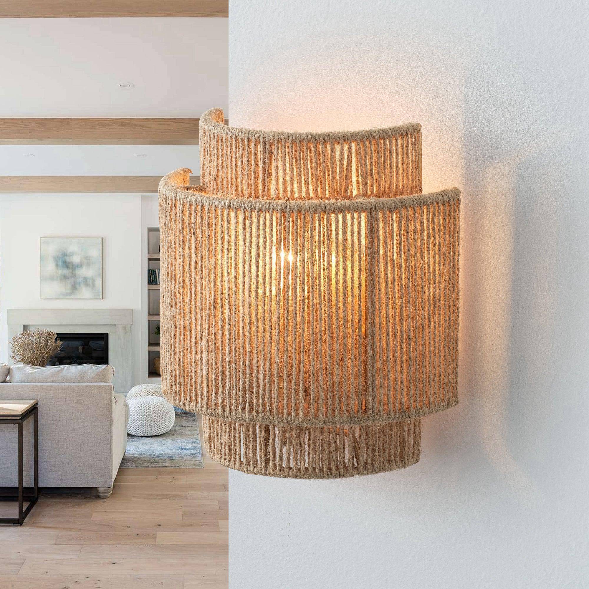 Brown rattan wall sconce with warm-lit bulb inside drum shade