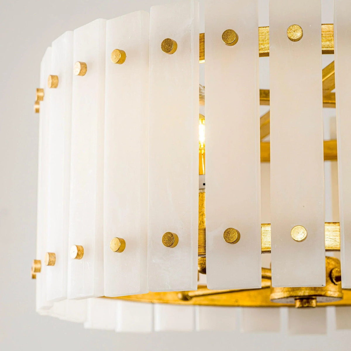 Golden 4-light drum semi flush ceiling light with white ribbed panels